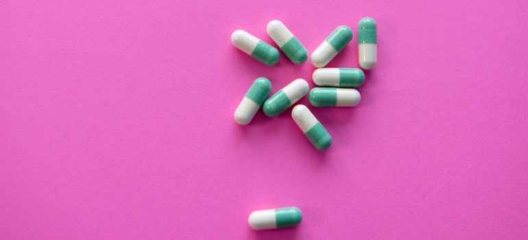  pills on pink background 