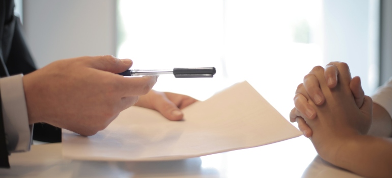 a person signing a document
