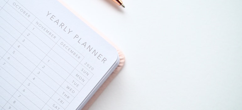 Yearly planner on a desk.