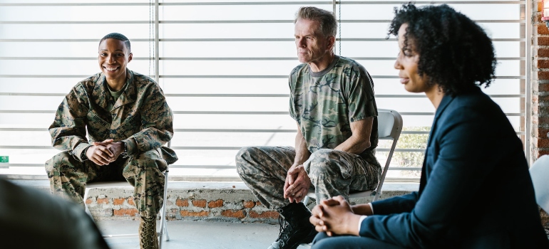 therapist explaining rehab for veterans 