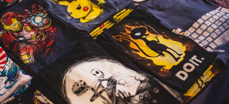 several T-shirts with graphic images