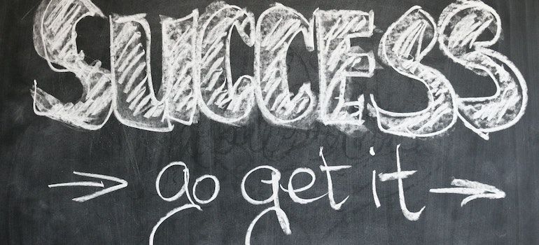 The word success written on a black board to emphasize the importance of recovery capital in sustaining sobriety
