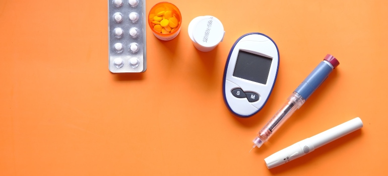 Diabetes kit on an orange surface