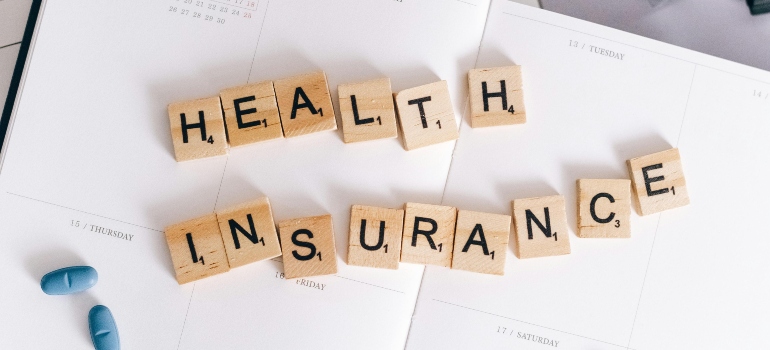 Health insurance with scrabble letters
