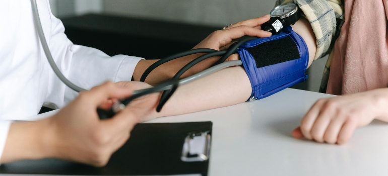 A doctor measuring blood pressure