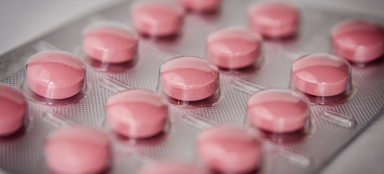 Pink tablets in a blister pack represent difference between stimulants and depressants