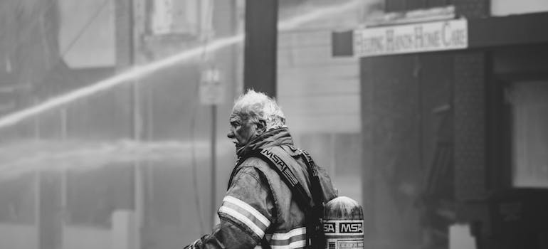 Black and white picture of a firefighter.