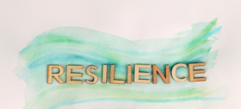 A resilience letters on the white background with blue lines