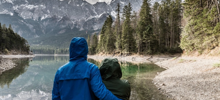 A couple standing near the waters