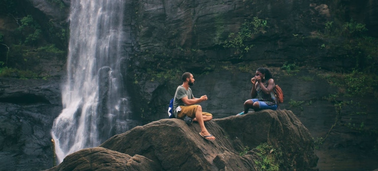 two people enjoying nature and thinking if to Attend Rehab Away from Home