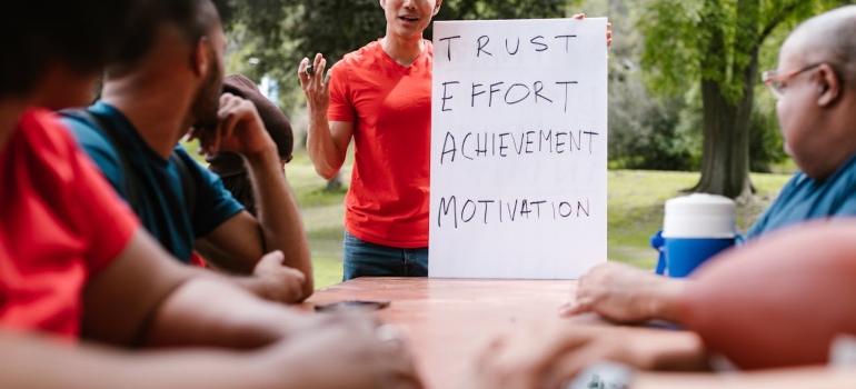 A man establishing rules on a gathering in nature