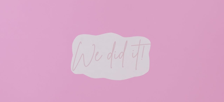 We did it cursive on the pink background