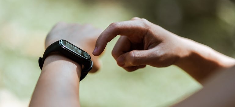 Man using a smart watch.