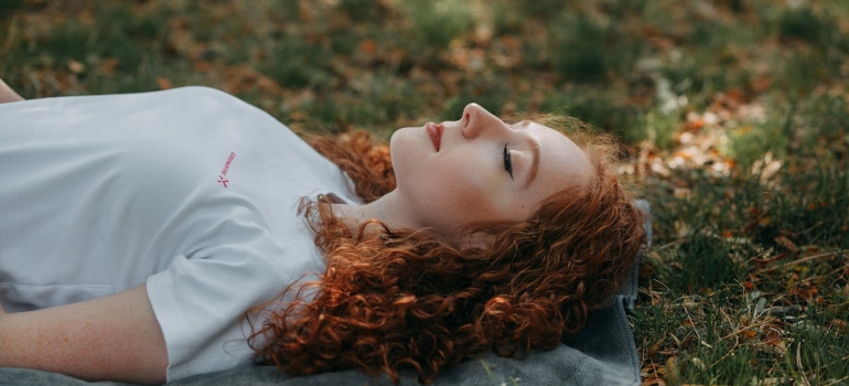 A woman laying on the ground