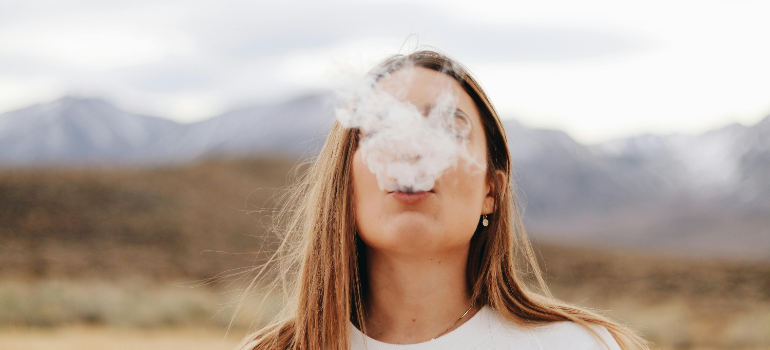 a young girl smoking