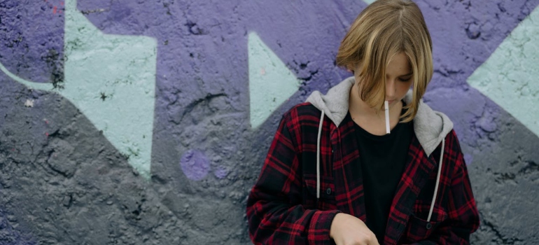 A teenager with a cigarette