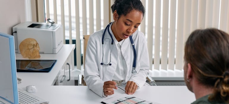 Doctor talking to a patient.