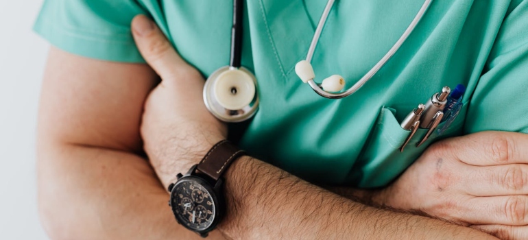 A doctor with stethoscope symbolizes Common Drugs That Can Cause Suicidal Thoughts and how their usage needs to be monitored