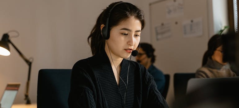 Woman working at a helpline.