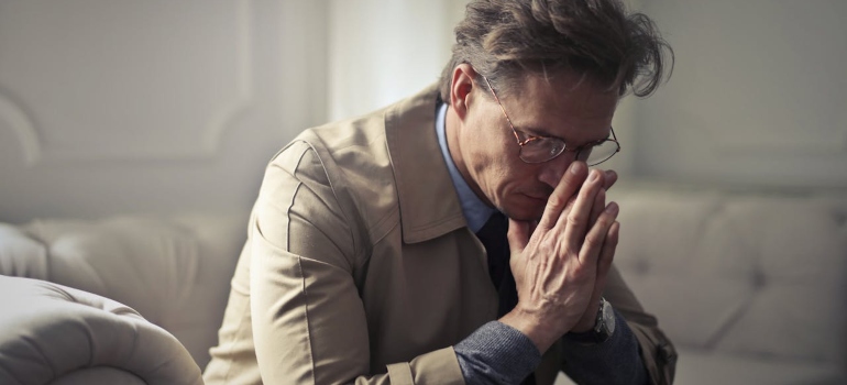 a man trying to concentrate and Recognize the Early Signs of Ambien Dependence