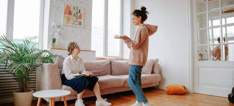 Young woman talking to a therapist.