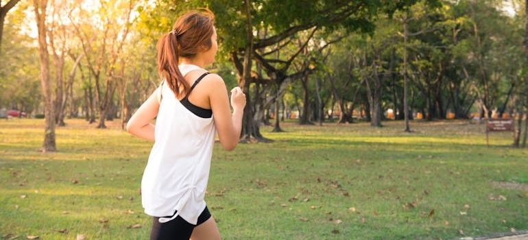 Woman running in a park.