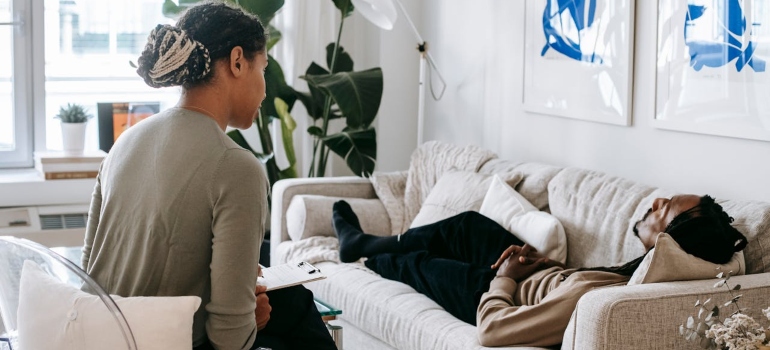 a therapist talking to a patient about Strategies to Prevent Prescription Drugs Abuse