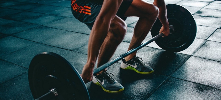 Person holding barbell