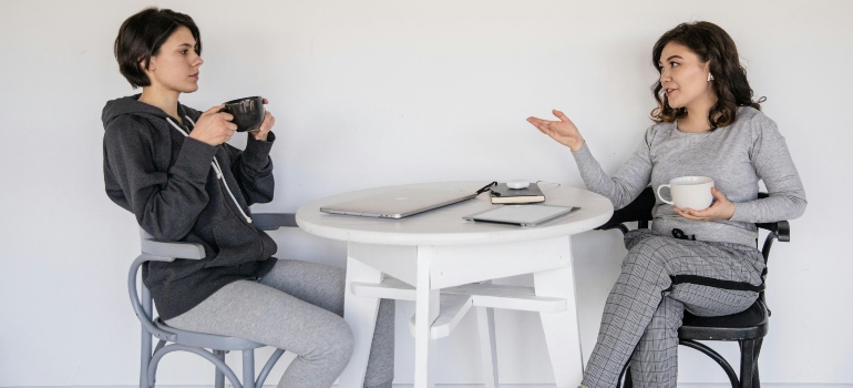 Two women talking to each other