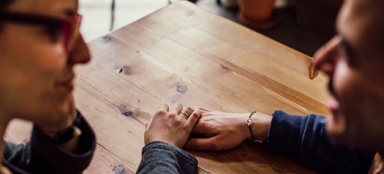 a woman consoling a man