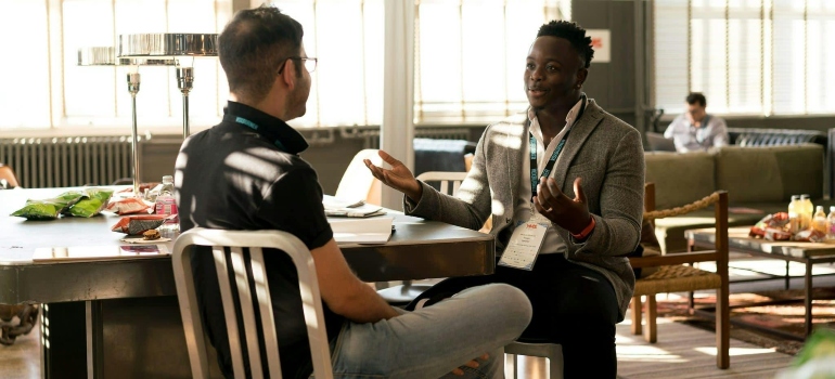 Two men having a conversation about how to explain your addiction to a loved one