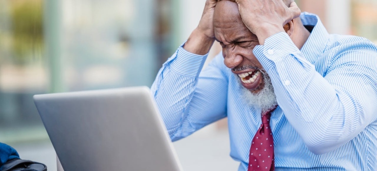 man stressed because of work