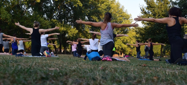 women doing yoga in nature as one of the Things You Will Love About Being Sober in West Virginia