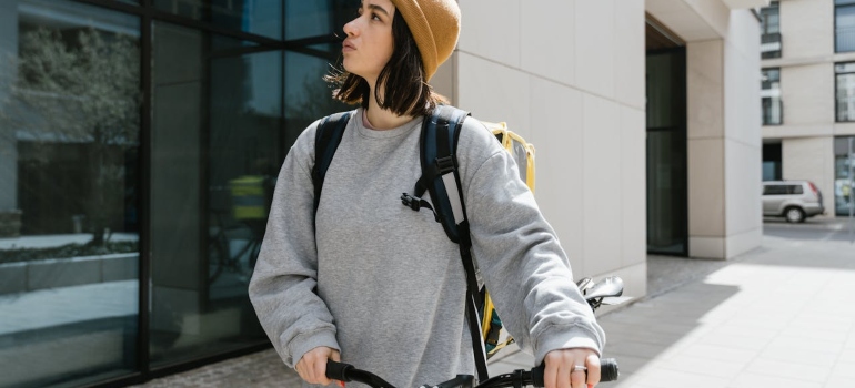 a girl running errands on a bike