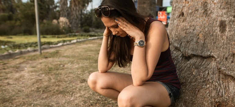 a stressed woman in the park