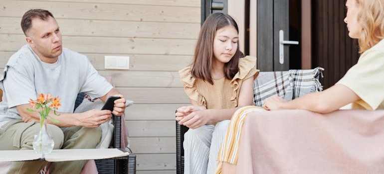 Family talking about what to do when someone doesn't want help.