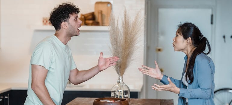 A couple having an argument in their living room.