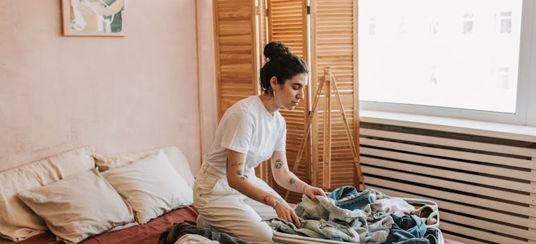 Woman packing for her stay at an inpatient rehab facility.