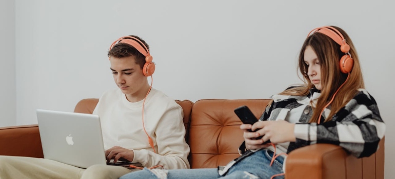 young people sitting on the couch